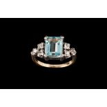 AN AQUAMARINE AND DIAMOND SET DRESS RING,