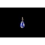 A MODERN BLUE ENAMEL AND DIAMOND FABERGE EGG PENDANT, mounted in 18ct white gold,