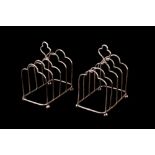 A PAIR OF SILVER HM TOAST RACKS