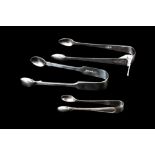 THREE SILVER SUGAR TONGS,