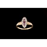 AN ANTIQUE RUBY AND DIAMOND MARQUISE SHAPED RING,