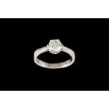 A DIAMOND SOLITAIRE RING, with one round brilliant cut diamond of approx 1.