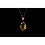 A CITRINE PENDANT, mounted in 18ct yellow gold,
