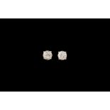 A PAIR OF DIAMOND SOLITAIRE STUD EARRINGS, Estimated 0.