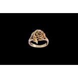 A 14CT GOLD 'ROSE' RING, by Pat Dolan,