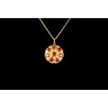 AN 18CT GOLD BALL PENDANT, mounted on 18ct yellow gold,