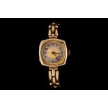 A LADIES 18CT YELLOW GOLD STATE WRIST WATCH,