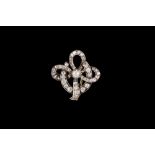 A VICTORIAN DIAMOND SET BROOCH, of quatrefoil design,