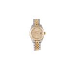 A LADIES ROLEX OYSTER PERPETUAL DATEJUST WRIST WATCH, bi-metal, with champagne face, baton markers,