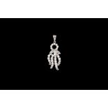 A DIAMOND PENDANT, modelled as an octopus, of approx. 1.