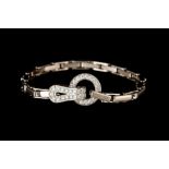 A DIAMOND "AGRAFE" BRACELET BY CARTIER, in 18ct white gold, with diamonds of approx 1.25ct.