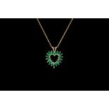 A GREEN GEM SET HEART SHAPED PENDANT, mounted in 14ct gold,