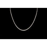 A GRADUATED DIAMOND NECKLACE, of approx. 7.