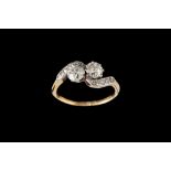 A DIAMOND TOI ET MOI RING, with two old European cut diamonds of approx 1.30ct in total I/J VS2/SI1.