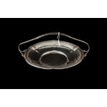 A MODERN USA STERLING SILVER CIRCULAR HANDLED BREAD BASKET,