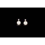 A PAIR OF CULTURED PEARL AND DIAMOND SET EARRINGS,