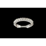 A DIAMOND ETERNITY RING, of approx. 1.