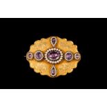 AN ANTIQUE AMETHYST AND SEED PEARL SET MOURNING BROOCH,