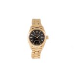 A LADIES 18CT GOLD ROLEX DATEJUST WRIST WATCH, with black face,