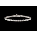 A DIAMOND LINE BRACELET, of approx. 7.21ct G-H VS, mounted on 18ct white gold