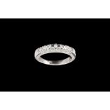 A DIAMOND SET HALF ETERNITY RING, of approx. 0.