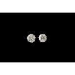 A PAIR OF DIAMOND SOLITAIRE STUD EARRINGS, two transitional brilliant cut diamonds of approx 2.