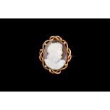 A LARGE OVAL PORTRAIT SHELL CAMEO BROOCH