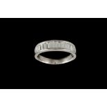 A HALF ETERNITY DIAMOND RING,