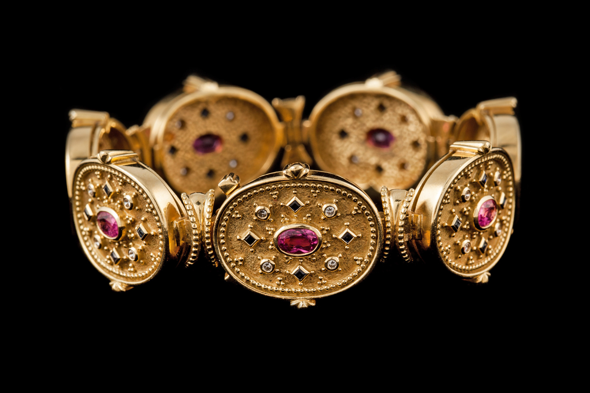 A PINK SAPPHIRE AND DIAMOND PANEL BRACELET,