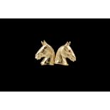 A PAIR OF GOLD HORSE HEAD EARRINGS,