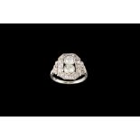 AN ART DECO DIAMOND TWO STONE RING, with diamonds of approx 1.20ct in total.