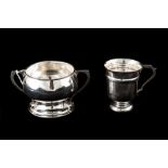 A DOUBLE CHRISTENING SET, cased, comprising of a silver Christening mug,