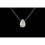 A DIAMOND CLUSTER PENDANT, with centre pear shaped diamond of approx. 3.