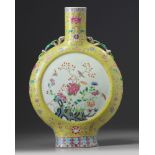 A Chinese famille rose yellow-ground moonflask
