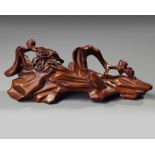 A Chinese carved boxwood 'prunus branch' brushrest