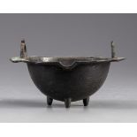 An Islamic bronze bowl