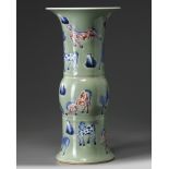 A Chinese celadon-ground blue and white and copper-red-decorated gu vase