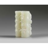 A Chinese pale celadon jade ‘monkey and bamboo’ carving