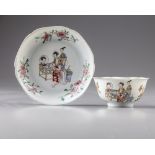 A Chinese famille rose ‘lady and boy’ lobed bowl and saucer