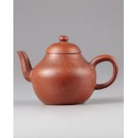 A Chinese yixing teapot and cover