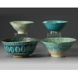 Four Islamic turquoise glazed bowls