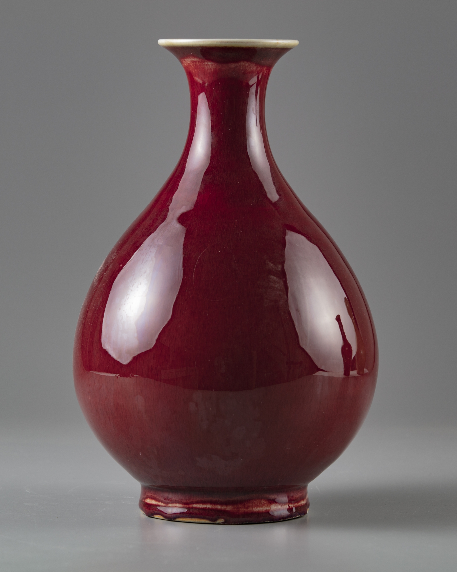 A red glazed pear shaped vase 'yuhuchunping'