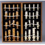 A Chinese wooden chess game with ivory pins