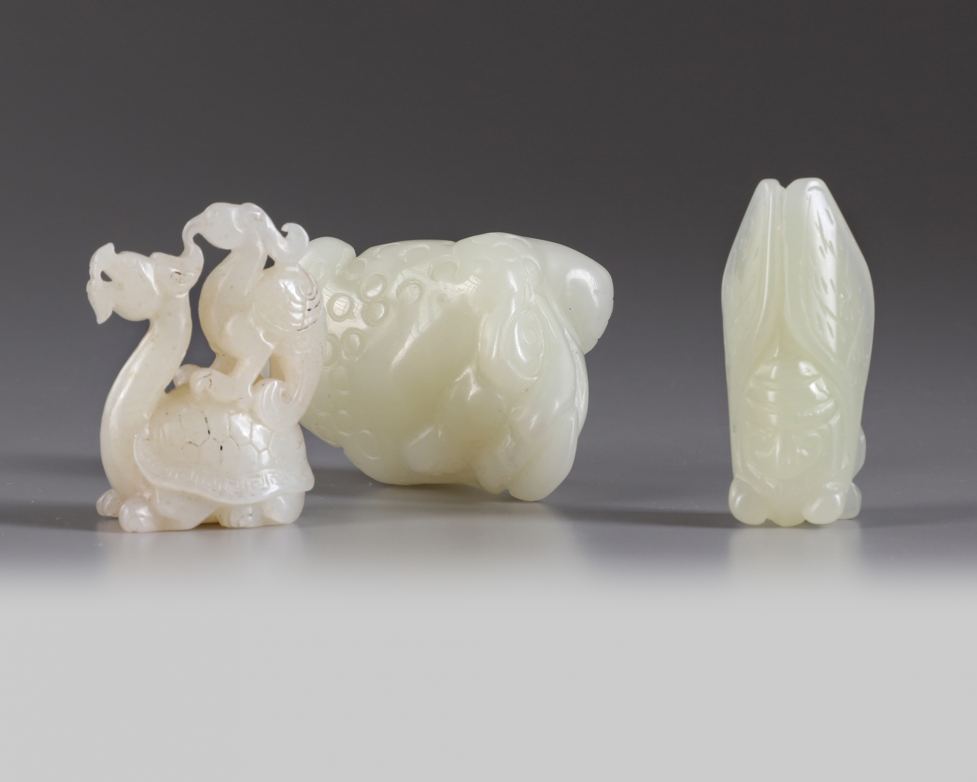 A group of Chinese white and pale celadon jade mythical beast carvings - Image 2 of 3