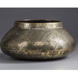 An Islamic brass pot