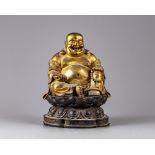 A gilt bronze figure of budai