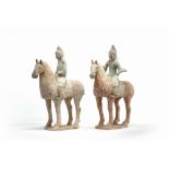 A pair of Chinese pottery equestrians