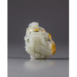 A Chinese white jade ‘Buddhist lion and cubs’ carving