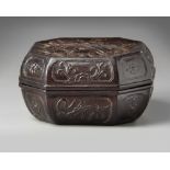 A Chinese carved hardwood ‘Eight Immortals’ octagonal box and cover