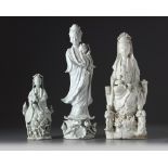 Three Chinese white-glazed figures of Guanyin